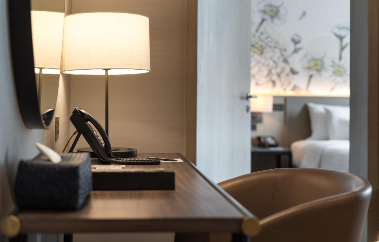Sivatel Bangkok Hotel Kültér fotó A telephone in a hotel room
